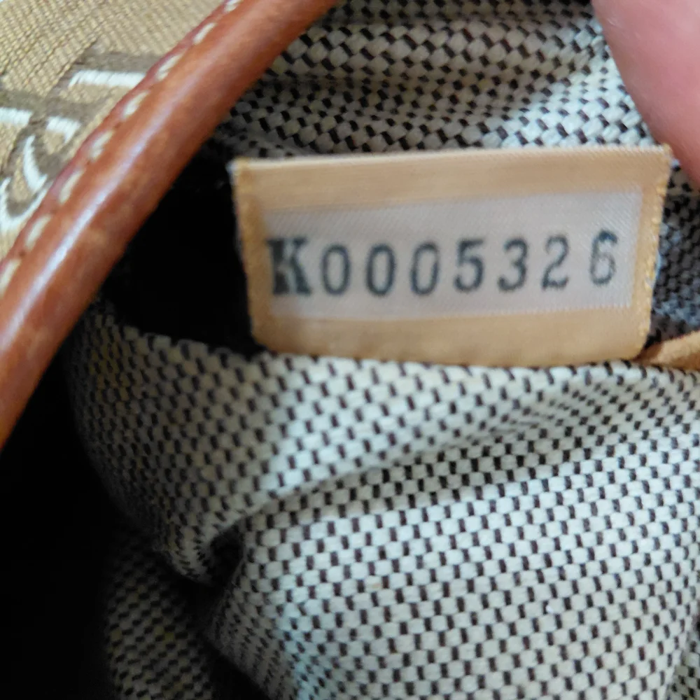 Dooney & Bourke Brown Monogram Hobo Bag